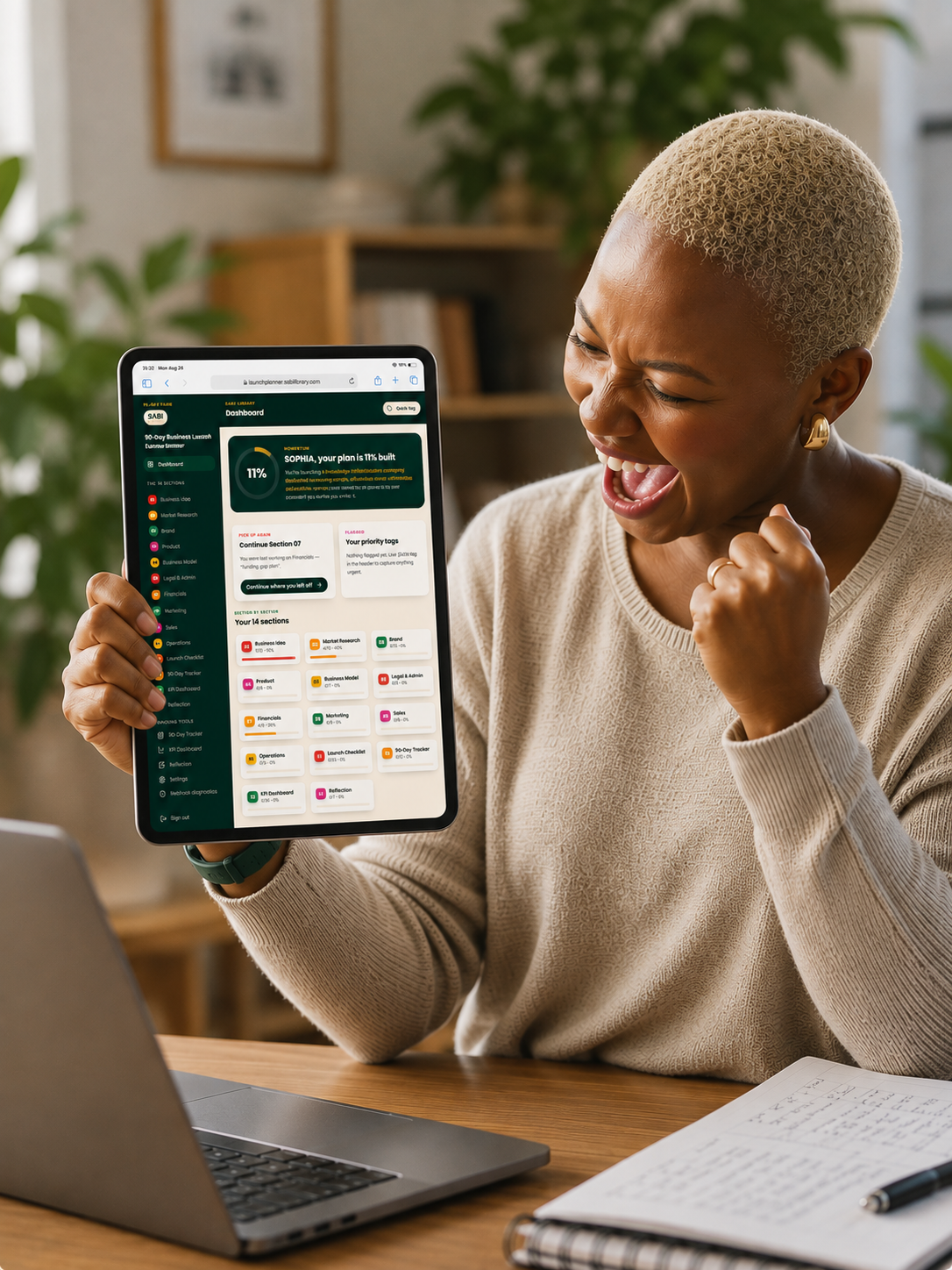 Founder celebrating progress on her 90-Day Business Launch Planner